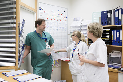 A group of health care workers in a room
