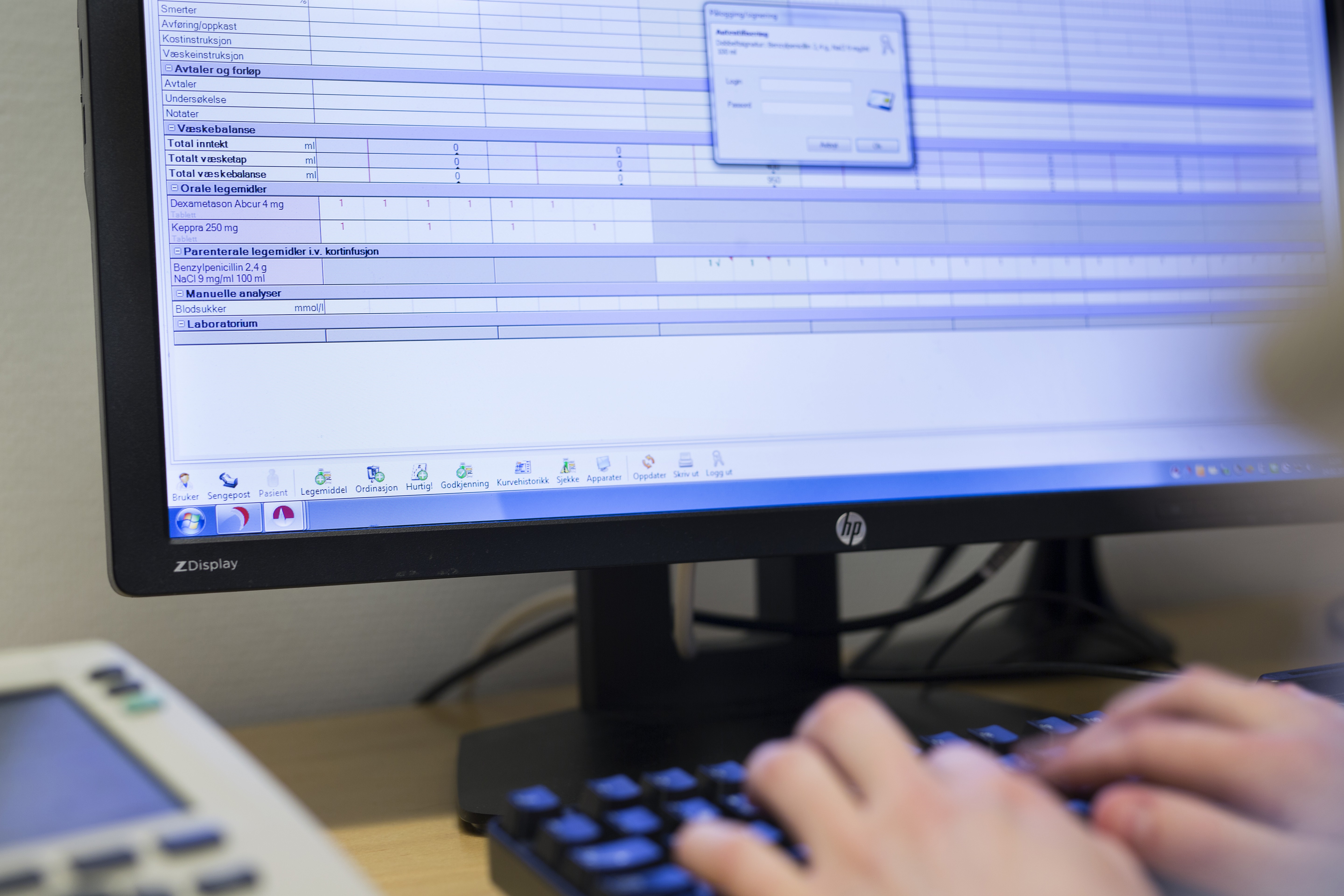 A person typing on a keyboard